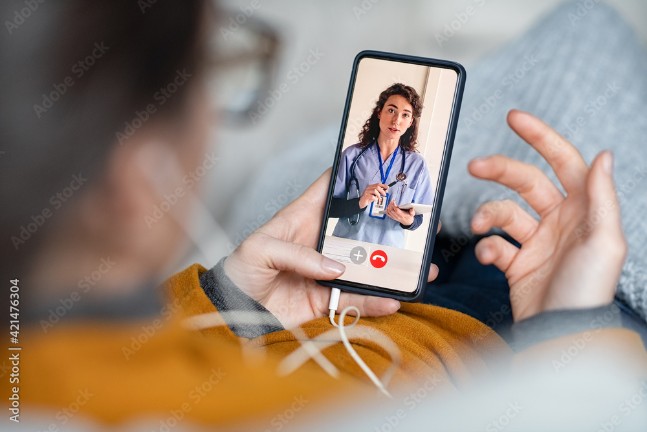 Telehealth woman doing a video call with doctor