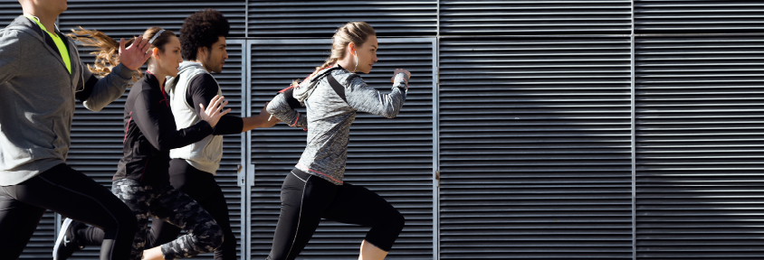 A group of athletes performs cardio during the winter months to cross-train.