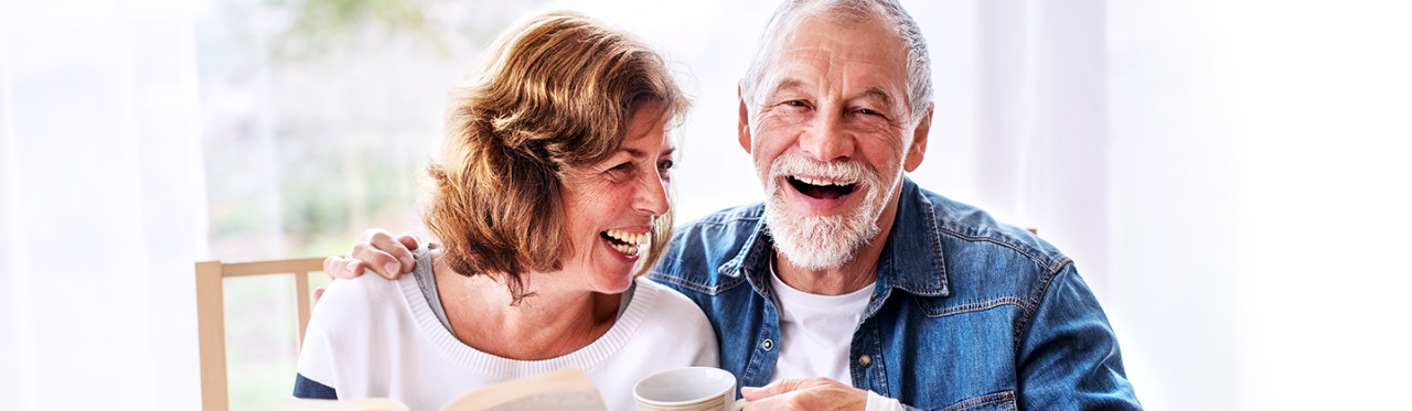 A couple works on a crossword puzzle together to improve their cognitive abilities. 