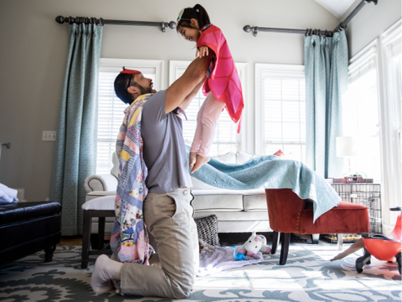 Learn About Heart Month Father and daughter celebrate heart month by playing a game together.