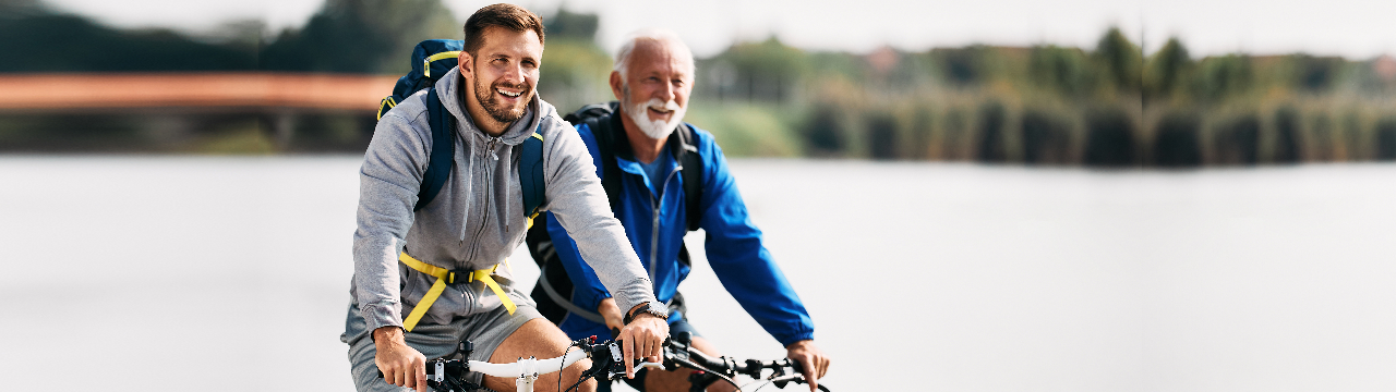 two gentlemen riding their bike