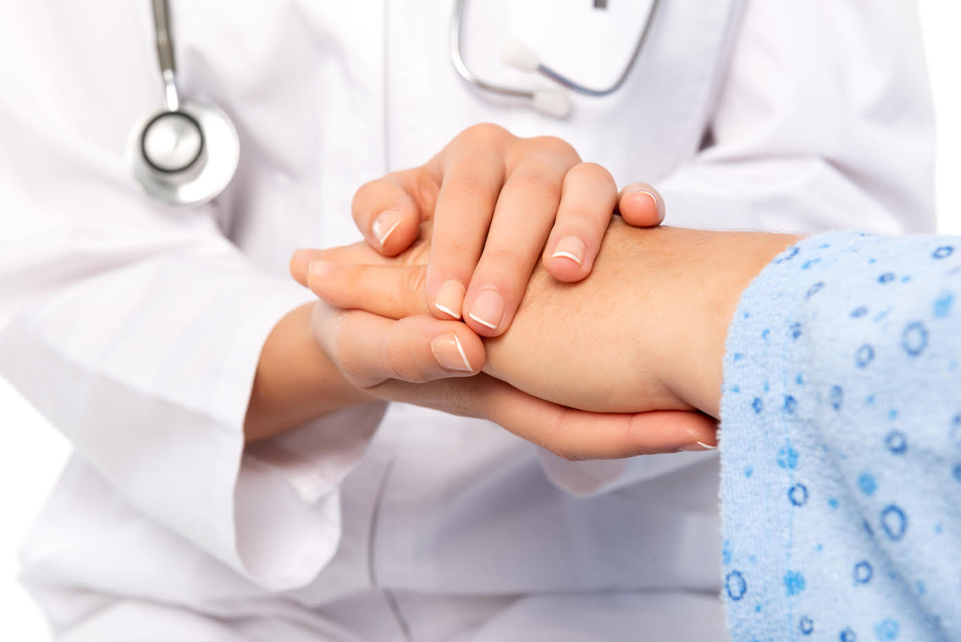 Doctor holding patient's hands