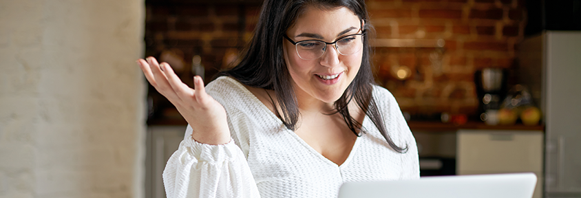 An overweight woman consults virtually with a highly qualified bariatric surgeon about her weight loss options.