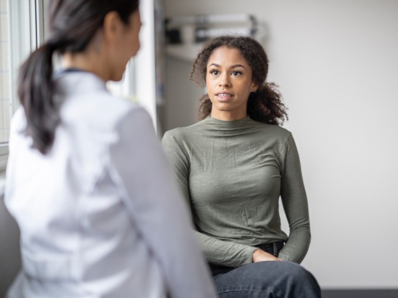 A patient asking their provider some questions about endometriosis.