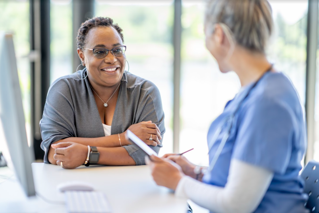 Two health care workers collaborating