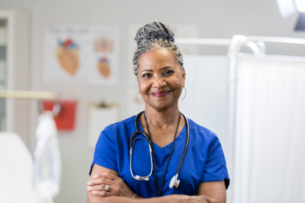 health care professional standing strong 