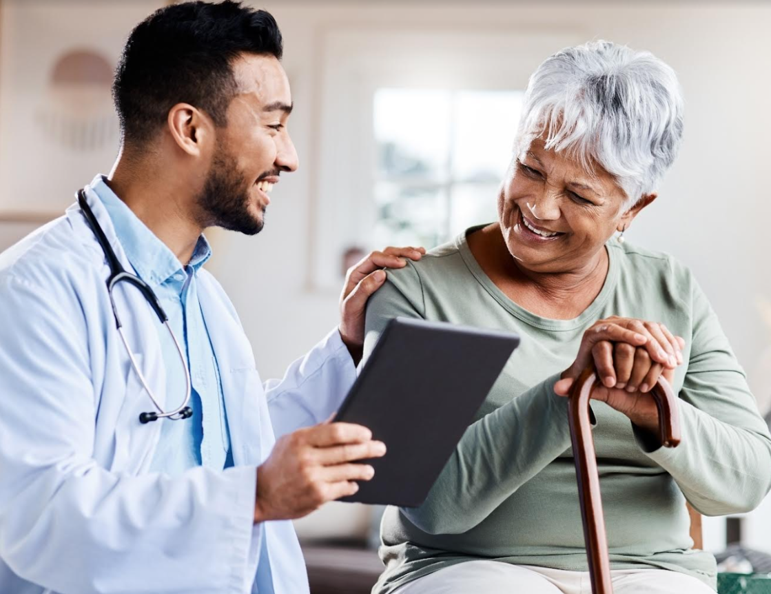 Male physician talking to hid patient