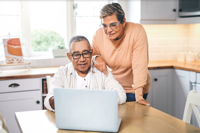 couple looking at a computer screen