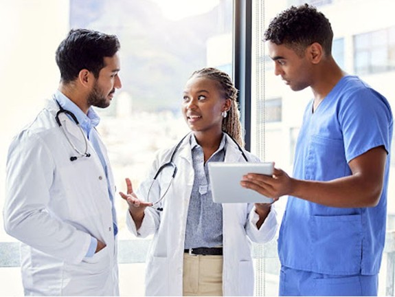 Group of healthcare providers talking with each other