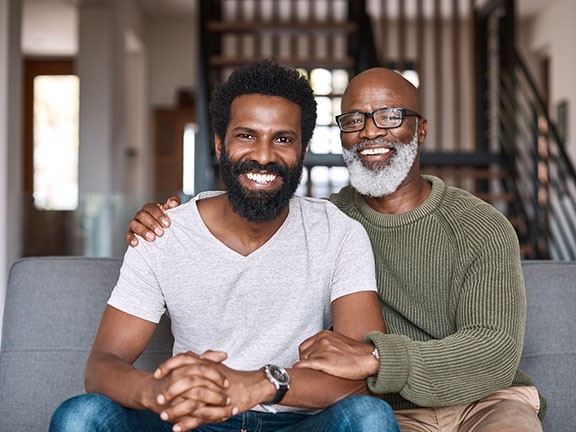 A father and son embracing the moment.