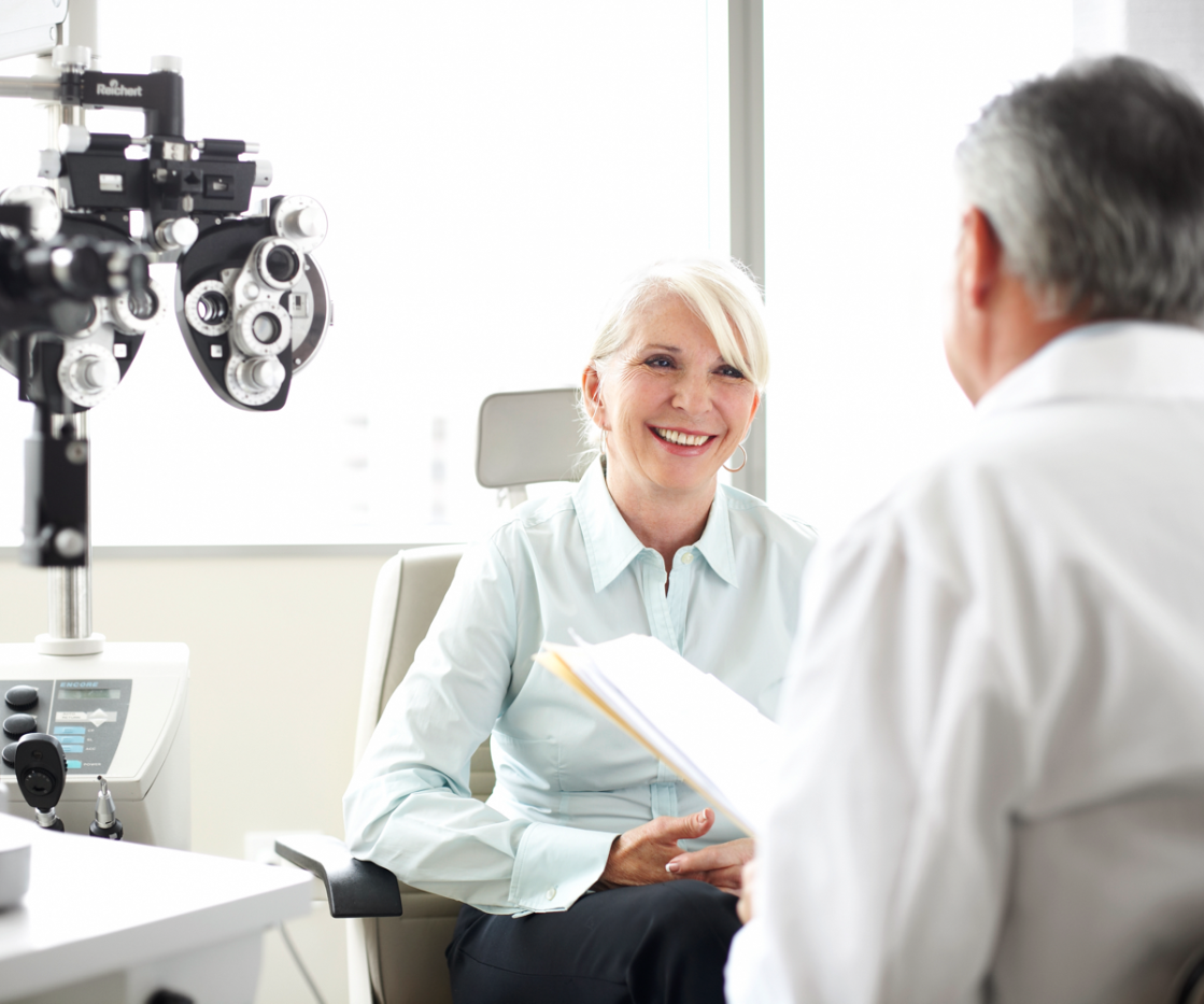 Doctor caring for older patient.