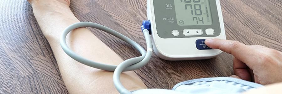 Man taking blood pressure reading