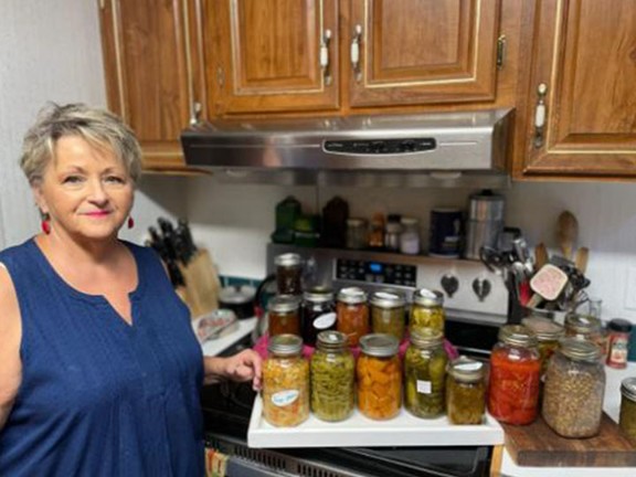 Dovie Burnett Bates canning vegetables post cardiac surgery.