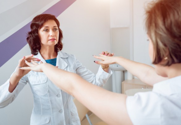 Doctor performing neurological examination to diagnose stroke