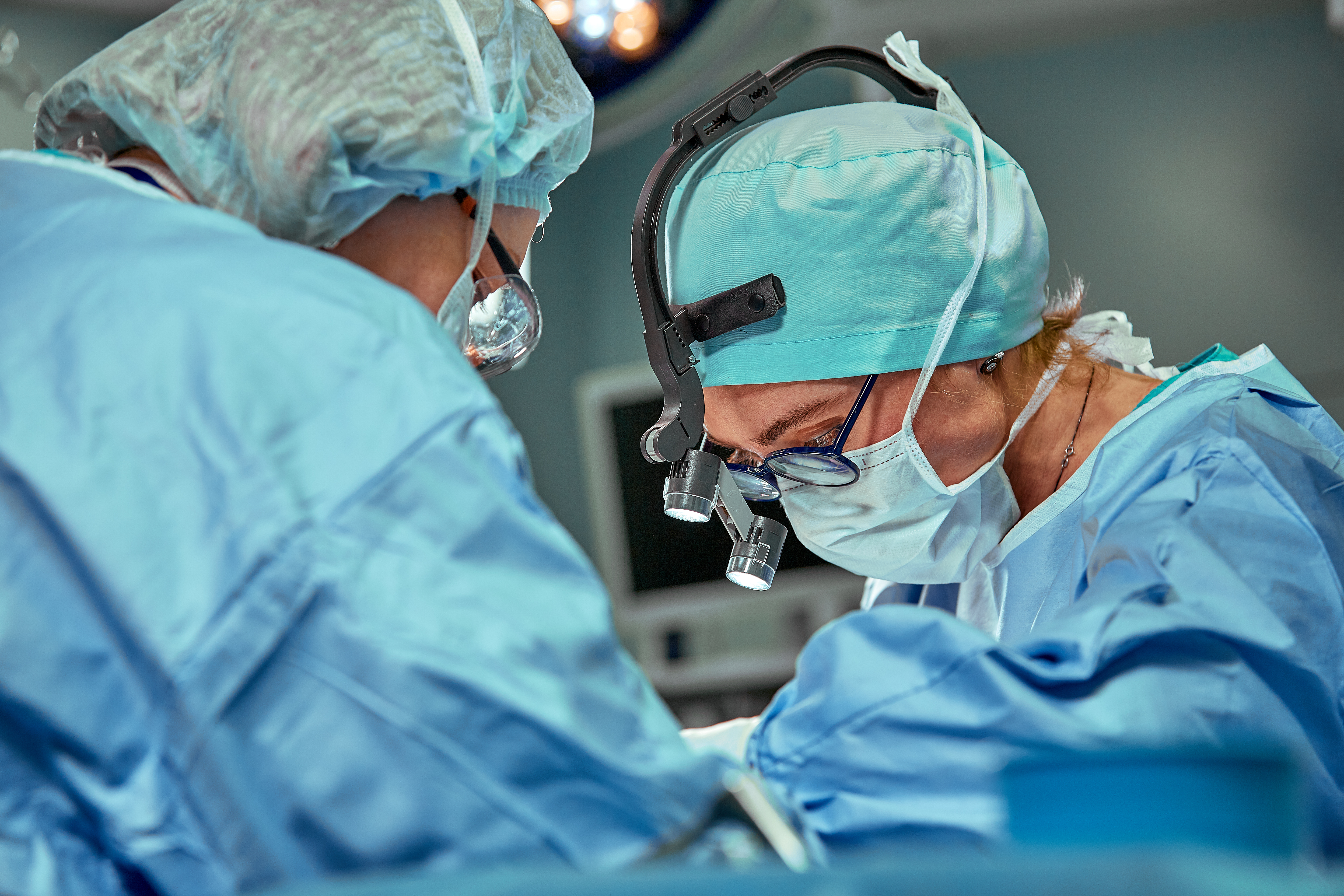 A heart surgeon and an electrophysiologist operate on a heart with persistent AFib.