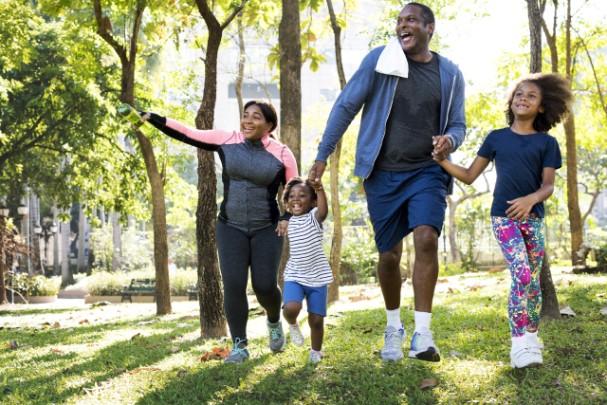 Family excited to exercise in the park 