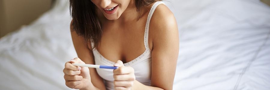 Woman with Pregnancy Test
